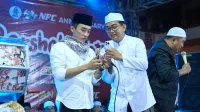 MENYEJUKKAN: NFC merayakan anniversary ke-3 melawat salawatan dan bagi-bagi hadiah. (K-TV/Ahmad Tamyizul)